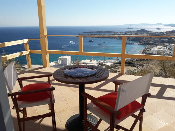 The place is located in paradise beach. There is a private road leading up to a   Reflections of Blue apts. Paradise beach Mykonos. Entire condo vacation rental 35690731