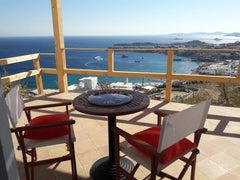 The place is located in paradise beach. There is a private road leading up to a   Reflections of Blue apts. Paradise beach Mykonos. Entire condo vacation rental 35690731