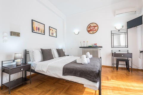 A cozy apartment full of light and good vibes in the heart of plaka , it has a s Athens, Greece Studio Under Acropolis Rock in ATH Entire rental unit vacation rental 5788192