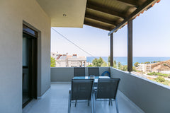 At the center of the famous resort , Panormos, and only 200 metres from the loca  Elena's house, 200 m from Panormos beach Entire rental unit vacation rental 34391387