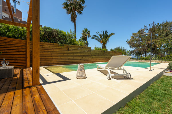 Wake up refreshed in the zen, sage-toned bedroom and step out into the garden fo Kounoupidiana, Greece Chania Elite Homes, Savor a Chic Oasis by the Pool Entire home vacation rental 35219666
