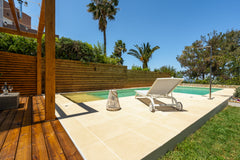 Wake up refreshed in the zen, sage-toned bedroom and step out into the garden fo Kounoupidiana, Greece Chania Elite Homes, Savor a Chic Oasis by the Pool Entire home vacation rental 35219666