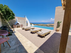 The unique view with the colours of the sunset mirrored on the surface of Libyan Athens, Greece Villa Grabella Amazing sea view with private pool Entire villa vacation rental 9608950