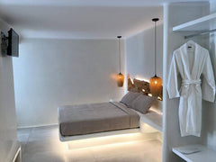 Brand new suite for 4 with terrace and a double 2 single beds walk in shower bui Mikonos, Greece Brand new suite for 4 with  terrace in front Room in serviced apartment vacation rental 24383032