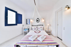 Agnadi Villas Santorini is a brilliantly whitewashed building surrounded by beau  Agnadi Economy Room Private room in bed and breakfast vacation rental 47506275