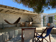 A small stone house, inside a beautiful garden, 200m by the sea, in Tinos island Greece Stone house by the sea in Tinos island Entire guesthouse vacation rental 20257901