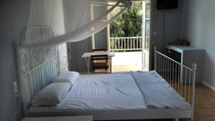 Room with privet entrance, has one double bed, toilet, kitchenette, small balcon  Korthi Garden Room1 20m from the sea Entire condo vacation rental 35525246
