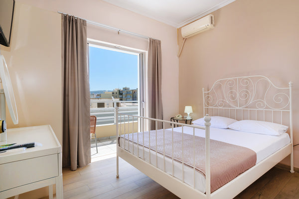 This Triple Room is located at the heart of Chania city center and it's part of  Chania, Greece Triple Room at the heart of the Chania center Private room in bed and breakfast vacation rental 31026901