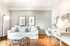 Unwind on the cozy, white sofa in the light-filled living room of an air-conditi Athens, Greece Retreat to a Sleek Flat in Central Syntagma Entire rental unit vacation rental 20398715