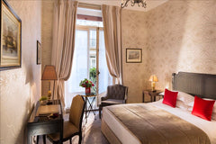 A cozy room with a sophisticated and personalized decor, decorated with beautifu  Parisian room near Avenue Montaigne with Breakfast Room in boutique hotel vacation rental 29024697