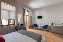 Junior Suite is a 27 sq.m suite, on the first floor of the hotel Bluebell Luxury Chania, Greece Junior Suite with balcony Room in hotel vacation rental 32860449