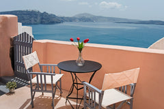 OIA BREEZE HOUSE has  2  bedrooms with double bed, a living room with a single b Oia, Greece OIA BREEZE HOUSE-VOLCANO VIEW Entire home vacation rental 6702239