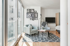 Sink into a dreamy mint-hued armchair and decompress at this soothing studio nea Vienna, Austria Explore Buzzing Boboville at a Pared-Back City Sanctuary Entire rental unit vacation rental 31511196