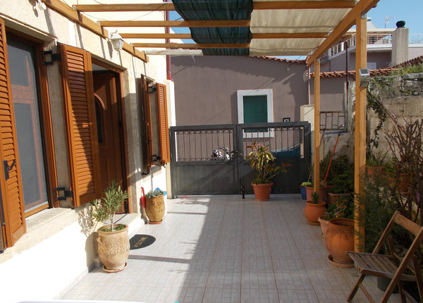 Traditional stone house in a quiet neighborhood near the main market, next to Ag Archanes, Greece Ontas Home #Ontas_Home Entire rental unit vacation rental 51768205