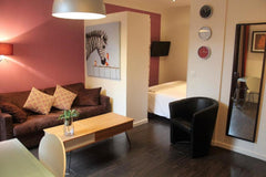 Close to the public garden this taupe and mauve coloured apartment will provide  Bordeaux, France Apartment-de la Course 1-Ensuite with Shower Entire rental unit vacation rental 845815