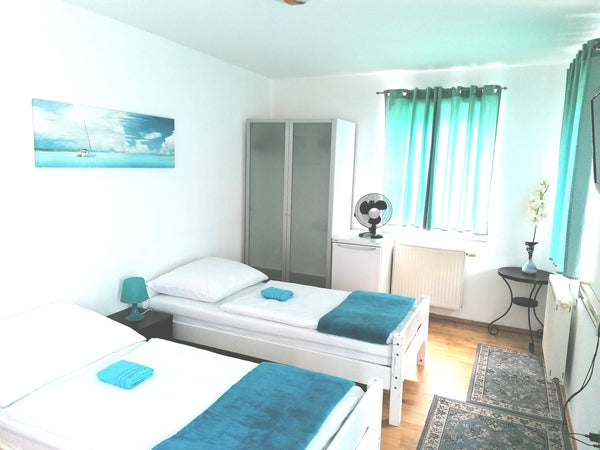 Our accommodation is located in the district of Favoriten in Vienna, not far fro  Zimmer-2Bett(n11),Terasse,U-Bahn,Hauptbahnhof,Wien Private room in rental unit vacation rental 49993043