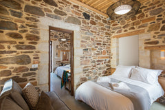 The Grand Deluxe Suite in Lameriana Secret Village is a spacious suite with two  Rethimnon, Greece Grand Deluxe Suite for family Entire condo vacation rental 7611124