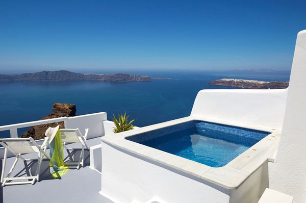Equipped with an outdoor private heated Jacuzzi on the private terrace, the Hone  Honeymoon Suite with private Jacuzzi & caldera view Private room in bed and breakfast vacation rental 21687210