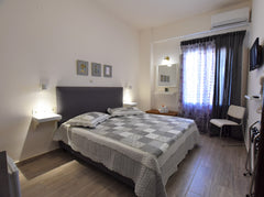 Rodakas Hotel, has 23 rooms with a total capacity of 64 people. <br />We served  Thera, Greece Cozy double room , sea view. Private room in bed and breakfast vacation rental 11805823