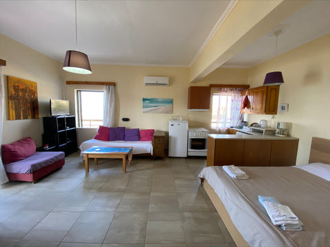 A private room with a balcony facing direct the sea,which is in a stone's throw  Chania, Greece Seafront Studio with Balcony Entire rental unit vacation rental 3284279