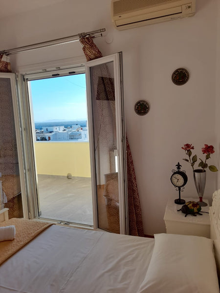 Keep it simple at this peaceful and centrally-located place.<br /><br /><b>Licen Greece Cheerful 2 - Bedroom home in Tinos Entire home vacation rental 652619464128580949