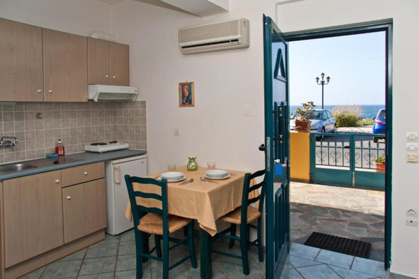 Marelina Villas is a beachfront hotel with a swimming pool in a very friendly at Rethimnon, Greece Marelina Villas - Studio Sea View Room in hotel vacation rental 51159673