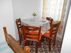 Traditional studio with the double bed located above the bathroom. Flat screen t  Popi Studios Cycladic home vacation rental 28292442