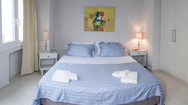 One room with 2 single beds and a living room with 2 single beds. Kitchen with w Heraklion, Greece Heraklion Old Port Apartments (B2) Entire rental unit vacation rental 19900074