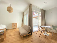 Lofty studio apartment in boho style with big windows and a tiny garden area nea Vienna, Austria AP 4 - Boho loft w/ garden close to subway (U2) Entire condo vacation rental 708706057680245742