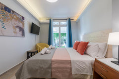 Imagine this....you wake up in your lovely raised firm mattress bed,in your tast Athens, Greece Splash of Glam II 1BR-APT 10 steps from Acropolis Entire condo vacation rental 50124602