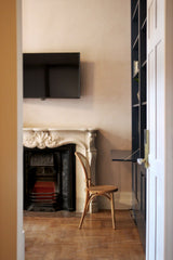 The carved marble fireplace and an old, decorated wall, hold the secret to the l Athens, Greece The Sonnet (Monsieur Didot - The residence) Room in bed and breakfast vacation rental 35825052