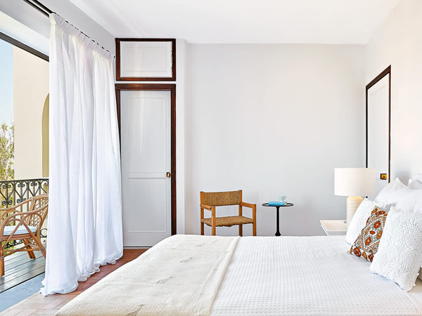 Contemporary accommodations showcase vibrant interiors, wood, rattan, bamboo or   Deluxe Guestroom Private room in resort vacation rental 49299774