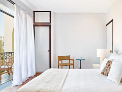 Contemporary accommodations showcase vibrant interiors, wood, rattan, bamboo or   Deluxe Guestroom Private room in resort vacation rental 49299774