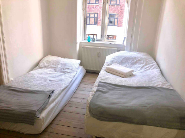 Room with one bed and a madras. The apartment is close to the city, and contains Copenhagen, Denmark Nice room 10 minuts from city Private room in rental unit vacation rental 32036270