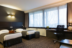 This room of 25m², offers one double bed or 2 single beds (upon request) et can   Chambre Confort proche aéroport Bruxelles Room in hotel vacation rental 569390983922679307