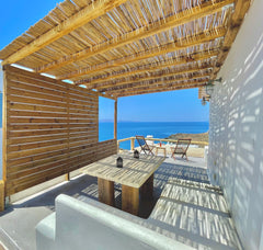 The villa is located next to a crystal-clear water beach with stunning view to A Pireas, Greece "THEA" 7 person Villa (Beachfront, WiFi - 100Mbps) Cycladic home vacation rental 42304528