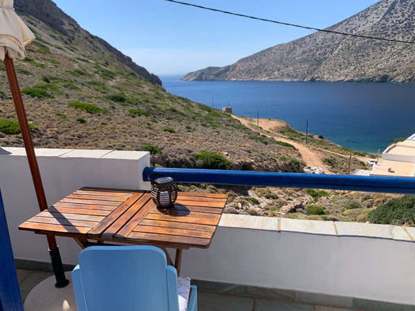 A traditional cycladic apartment lies at the edge of Sifnos harbor in an ideal l Greece Two bedroom apartment with unique sea view Entire rental unit vacation rental 592459231329503124