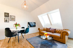 Step into the comfort of this stylish, sun-soaked rooftop apartment, with outsta Vienna, Austria Majestic Penthouse | Steps to City Center & Danube Entire rental unit vacation rental 44555616