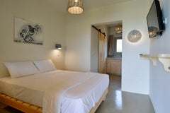 Facing the beachfront in Ándros, Rooster Miniature Apts features a garden.<br /> Athens, Greece Rooster Guesthouse rooms - Family Apartment Entire rental unit vacation rental 30782240