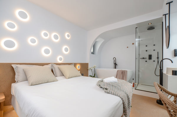 Decorated in Cycladic style, this spacious room features a king-size bed and a b  Laertes deluxe double with shower and bathtub Room in boutique hotel vacation rental 48175485