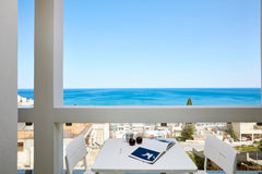 Enjoy a cool cocktail while watching the boats sail by the Fortezza castle. Unli Heraklion, Greece ♥ Charming Apt, Extraordinary seaview, 5' to beach Entire rental unit vacation rental 41946930