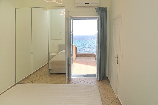 Fully equipped one-bedroom apartment with frontal sea view. One double bed in th  Oasea Apartment II Syros Entire condo vacation rental 18785654