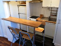 Il s'agit d'un studio de 30m2 avec cuisine américaine, un piano, une salle de ba Paris, France Studio cosy Entire rental unit vacation rental 4742982