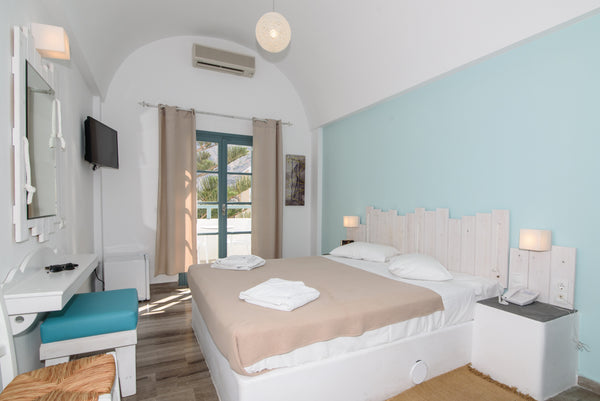 The Double room with balcony or terrace is newly renovated & offers all modern f Kamari, Greece Double Room with balcony&breakfast Private room in bed and breakfast vacation rental 41786448