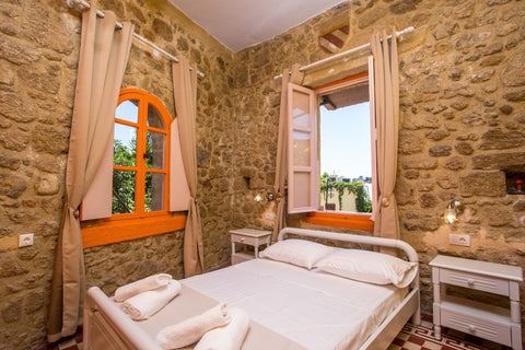 Hotel Attiki is located in Rhodes's old town. All rooms have a medieval decorati  Attiki hotel - Prasonisi ground floor Private room in bed and breakfast vacation rental 51220851