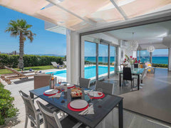 Modern decorated, big garden for relax during summer and a fireplace to keep you Greece Luxury Villa with Private pool next to sandy beach Entire villa vacation rental 7558928