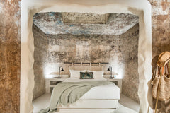 Welcoming you into natural cave interiors, where the original canava walls have   Winery Hotel 1870-Premier Suite Room in hotel vacation rental 44328447