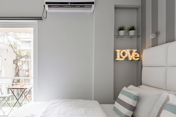 Awaken in a comfy white bed as morning light streams in through floor-to-ceiling Notios Tomeas Athinon, Greece Walk to Markets and Museums from a Cozy Studio Entire rental unit vacation rental 21794188