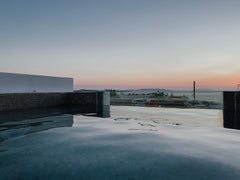 Opening to a big terrace which overlooks Mykonos Town and sea, our accommodation Greece Eternal Suites with Private Pool #1 Room in aparthotel vacation rental 24811396