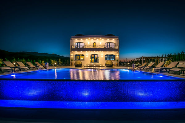 Villa Santorini sits atop a dramatic cliff that makes it seem like the dividing   Villa Santorini, Wine Dark Sea Villas Entire villa vacation rental 18246240